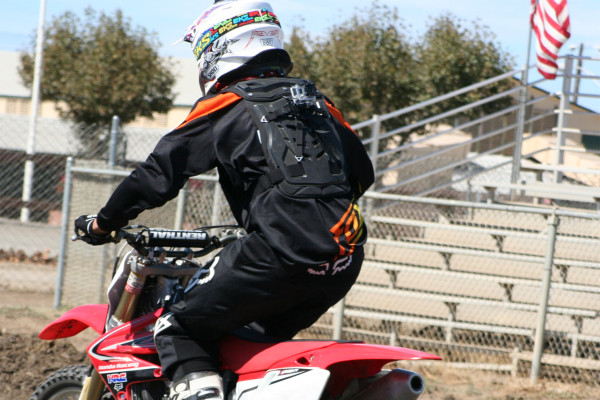 Image of rider with rear-mounted GoPro Hero 3 on Fox ProFrame, using the Moto Flak Mount